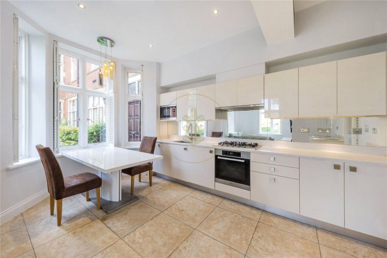 A superb two bedroom house situated within this gated Victorian school conversion